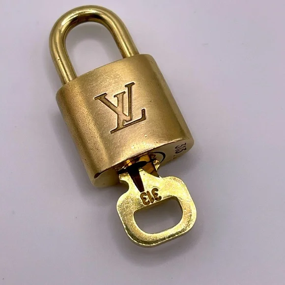 100% Authentic and pre loved Louis Vuitton - Gold Lock and Key set - #313 - Picture 1 of 6